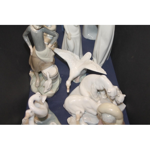 47 - Nao, and other, Spanish porcelain figurines.