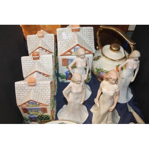 49 - Nao ballerina, pottery houses, porcelain figurines, etc.