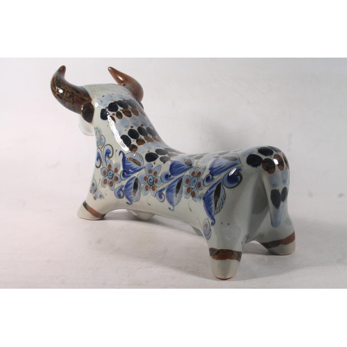 5 - Continental Studio Pottery model of a bull, 36cm long.