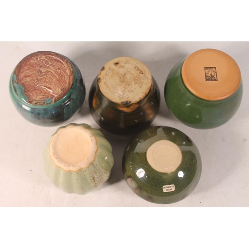 55 - Five Studio Pottery vases, largest 10cm high.