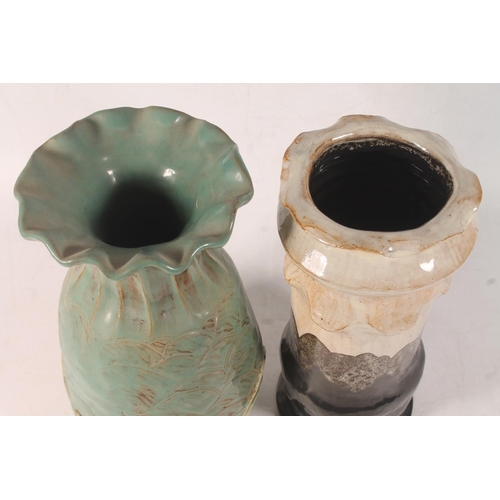 58 - Chimney form Studio Pottery and a green glazed Studio Pottery vase.