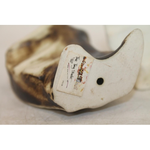 54 - Three abstract Studio Pottery figures, 13.5cm high.