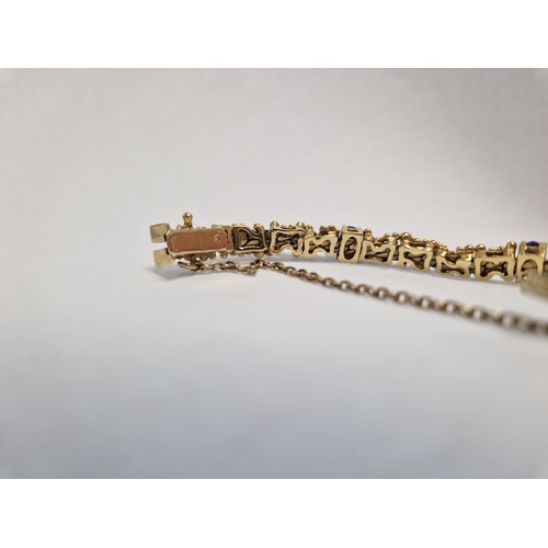 77 - Ladies 18ct yellow gold bracelet set with six lapis lazuli beads, gross weight 29.6g, approx. length... 