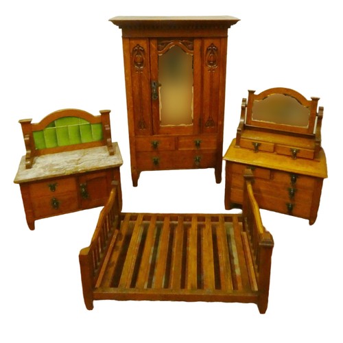 552 - Rare Art Nouveau-style oak four-piece bedroom suite, made for dolls, comprising a mirror-door wardro... 