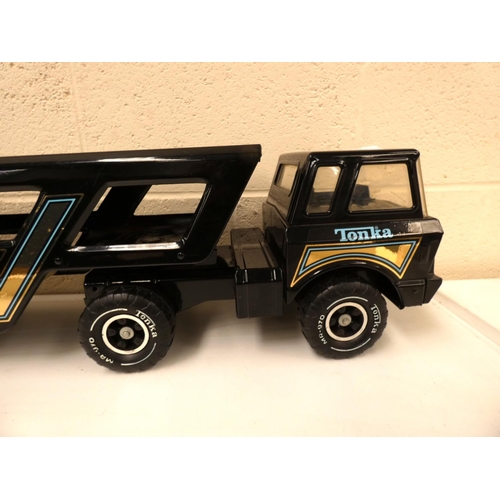 24 - Large tin plate Tonka Toy car transporter.