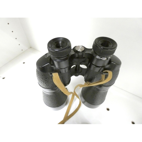 47 - Pair of cased US pattern binoculars and another small pair.