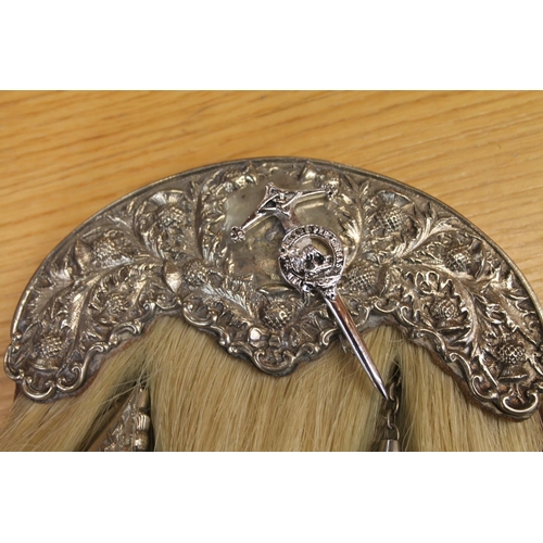 2 - Sporran and a similar belt.