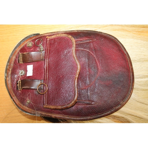 2 - Sporran and a similar belt.