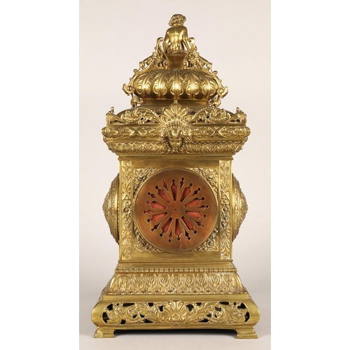 50 - Antique square brass mantel clock, classical ornamentation with putti sat atop and faces on all side... 