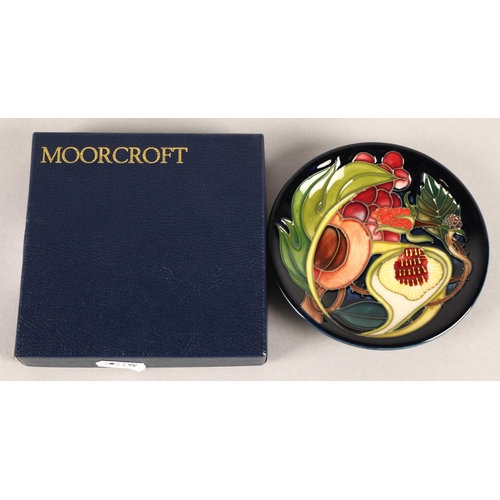22 - Moorcroft pottery 'Queens choice' patterned pin dish, 12cm diameter
