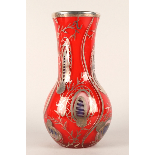 41 - Double layered glass vase with white metal overlay, stands 35cm