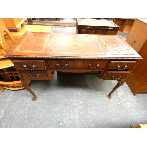 Reproduction leather top writing desk fitted five drawers. 120cm
