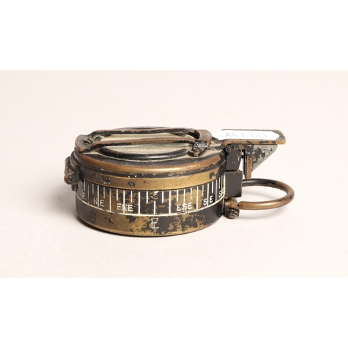 45 - Military issue compass TG Co. ltd. London no. 281117 1944 MK. III, and a shot pouch in wooden box