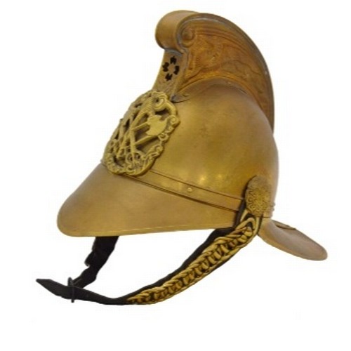 Replica brass fireman's helmet.