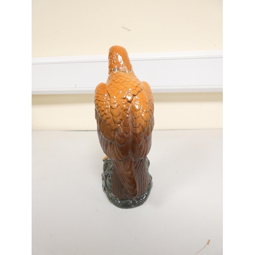 Whyte & Mackay blended whisky contained in a golden eagle decanter
