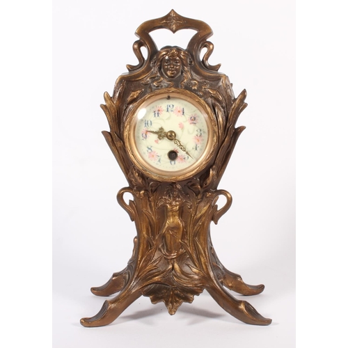Antique French cast metal mantel clock, the body decorated female ...