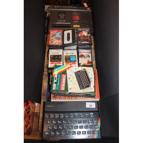 ZX Spectrum, games, manuals, and a computer programme data recorder.