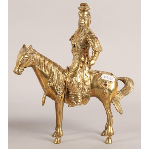 34 - Pair of brass Chinese warriors on horses, one with sword, each 25cm h. (2)