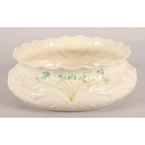 18 - Collection of Belleek ware to include bowl, posy vase, lidded pot, and cat figure (4)