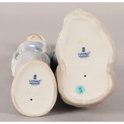 26 - Two Lladro figures to include 4650 Girl with Calla Lilies, and 4972 sitting with lilies (2)