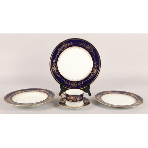 27 - Bernaudaud Limoges, blue and gold Fleurs Imperiales pattern dinner set