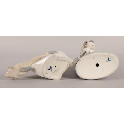 6 - Two Lladro figures to include 'Dog Playing Bass Fiddle' no.1154, and 'Cook in Trouble' no.4608 (2)