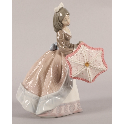 7 - Lladro figure, 'Jolie' no. 5210, girl with a parasol, 19cm h.