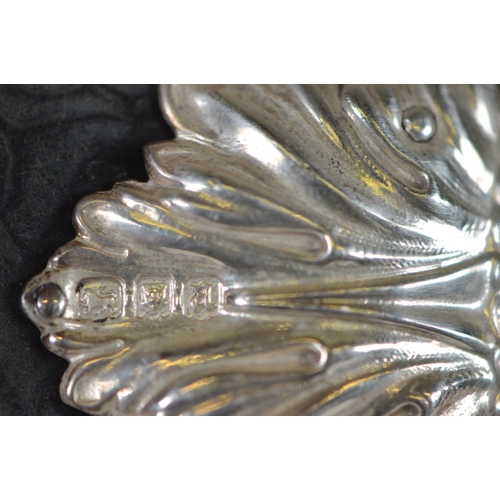 7 - Silver and tortoiseshell page turner, the handle embossed with a Dutch-style subject, Charles and Ri... 