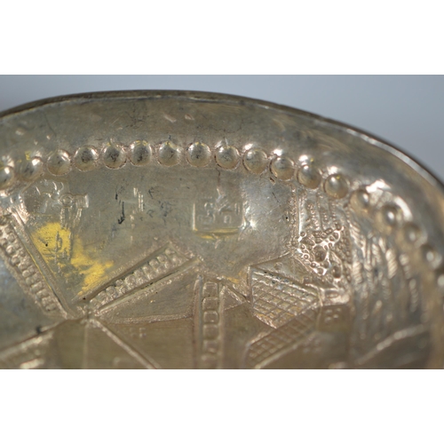 13 - Two Dutch silver spoons, c. late 19th century, with figure surmounts, embossed windmills and milkmai... 