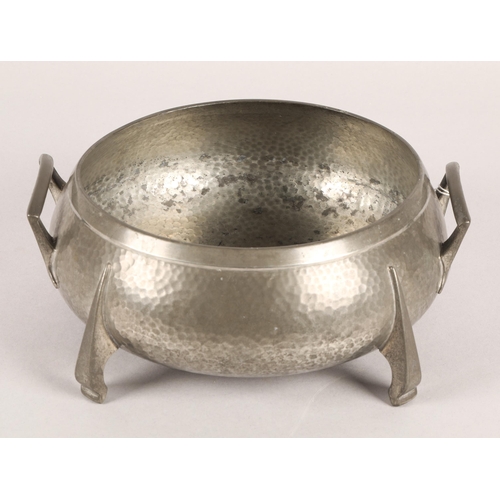 15 - Hammered pewter dish in the Arts & Crafts style with twin handles on four feet