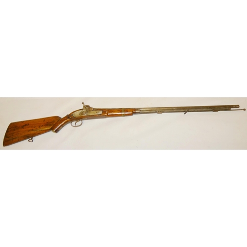 Indian percussion musket, c. late 19th century, with brass mounts and ...