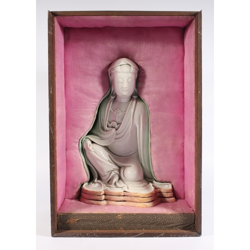 491 - Chinese blanc de chine porcelain figure of Guanyin, modelled in a seated position, 30cm tall, with o... 