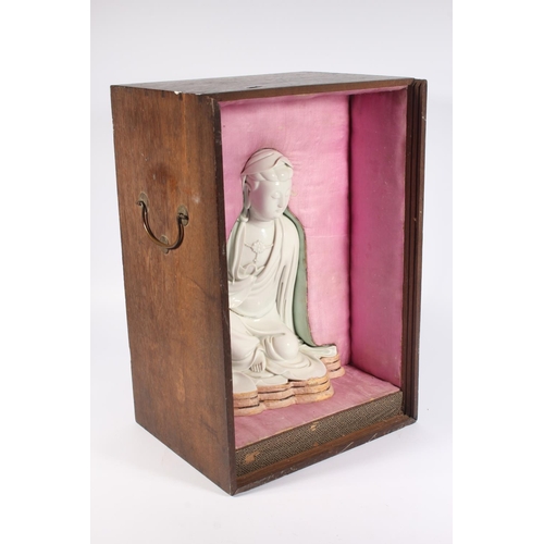 491 - Chinese blanc de chine porcelain figure of Guanyin, modelled in a seated position, 30cm tall, with o... 