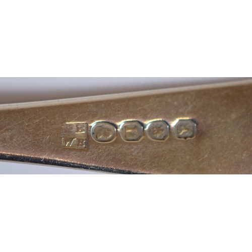15 - Two Regency silver tablespoons with fiddle stems, London 1803 and 1806, another two Georgian silver ... 