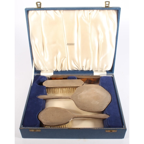 200T - Silver backed four piece dressing table set by Henry Clifford Davis, Birmingham 1962 and another mar... 