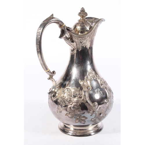 200U - Victorian silver four piece tea service of bullet and pear shape decorated in the Rococo manner with... 