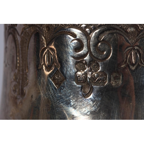 200U - Victorian silver four piece tea service of bullet and pear shape decorated in the Rococo manner with... 