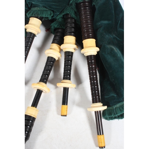 1895 - Set of Scottish bagpipes with ivory knops, the chanter stamped 'R G LAWRIE .... REGAL', in hinge top... 