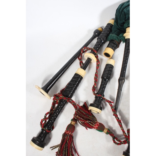 1895 - Set of Scottish bagpipes with ivory knops, the chanter stamped 'R G LAWRIE .... REGAL', in hinge top... 