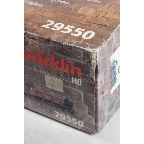 1033 - Marklin of Germany digital HO scale model railways 29550 Harry Potter Hogwarts Express 'Climb Aboard... 
