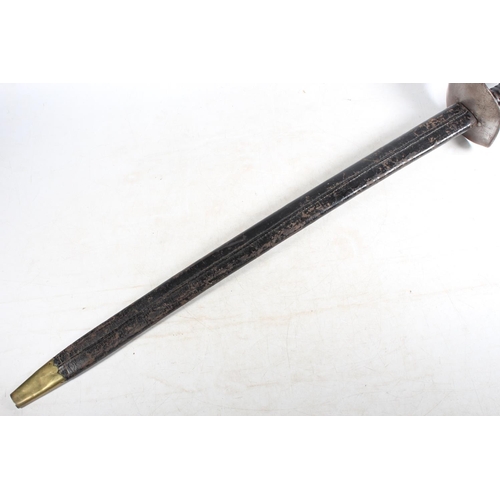19th century French naval cutlass having a broad unfullered blade, the ...