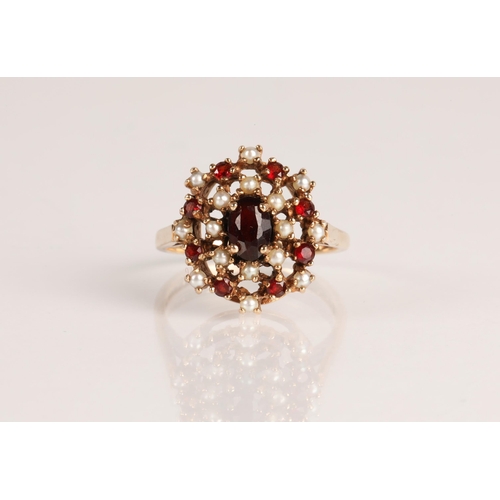 61 - 9ct gold garnet and seed pearl cluster ring, ring size N, 3.6g