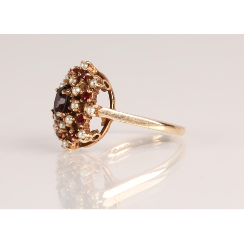 61 - 9ct gold garnet and seed pearl cluster ring, ring size N, 3.6g