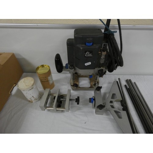 Modern Elu plunge router and sliders.