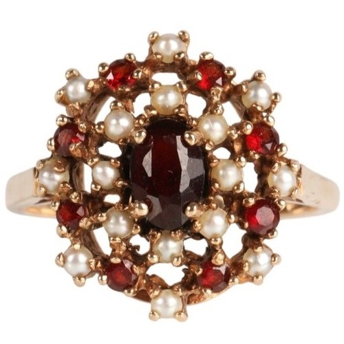 61 - 9ct gold garnet and seed pearl cluster ring, ring size N, 3.6g