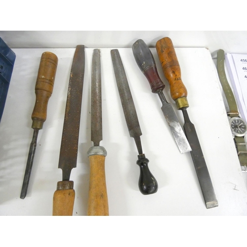 Box of vintage chisels and files.