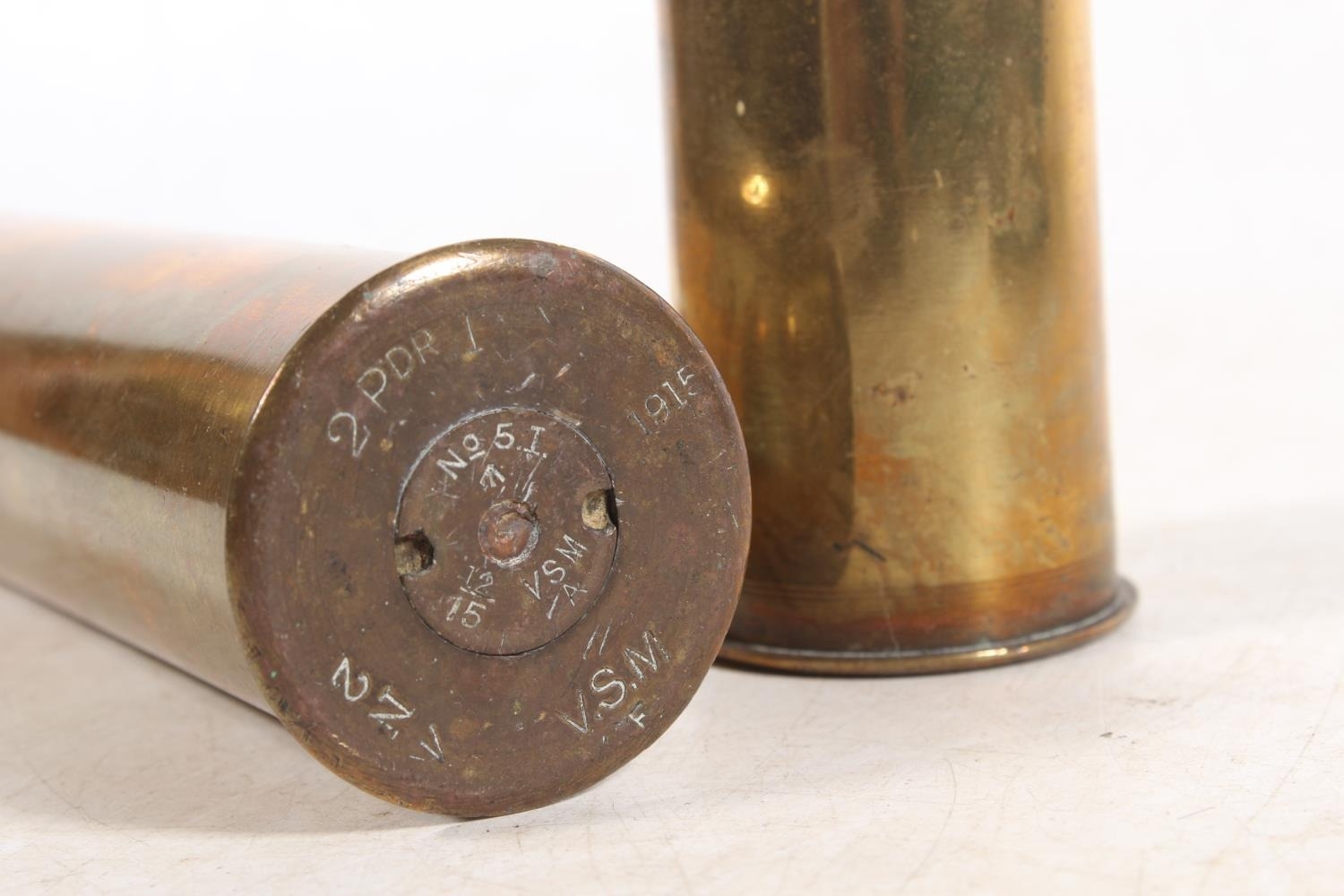 Pair of WWI two pounder mortar shells, dated 1915, 30cm high.