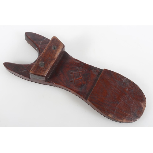37 - Masonic interest, a carved hardwood boot jack decorated with carved floral design, the reverse with ... 