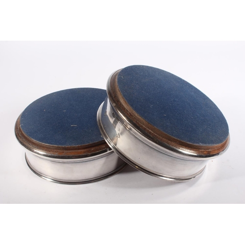 1 - Pair of contemporary silver and oak wine slides with blue fabric bases, Argyll Silver, Birmingham, 1... 