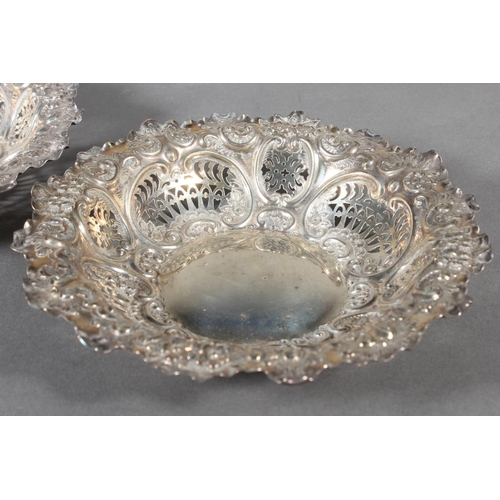 13 - Pair of Scottish silver pierced bowls with heavy repousse decoration, 18cm diameter, Hamilton & ... 